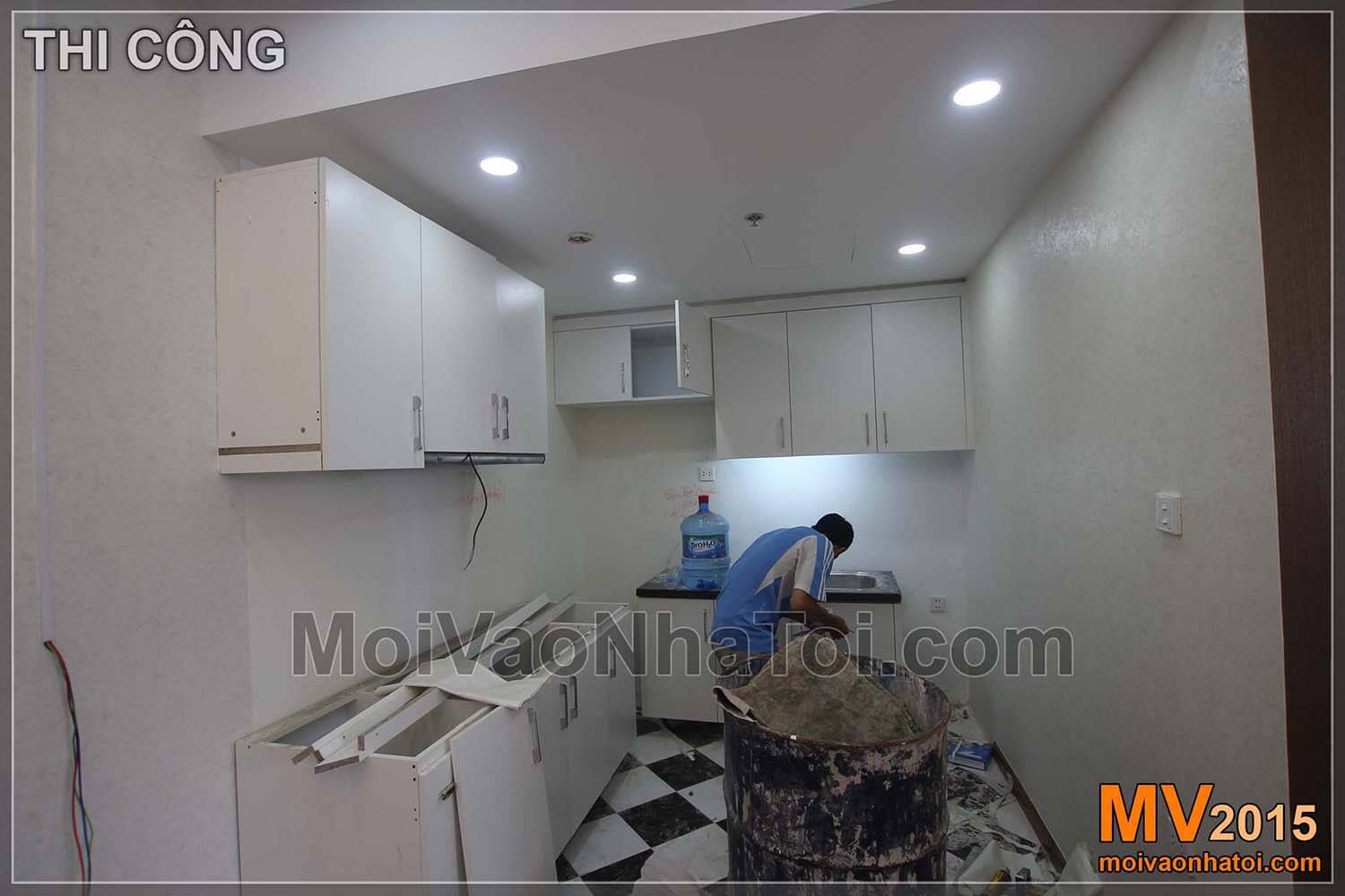 Construction process of apartment kitchen cabinets